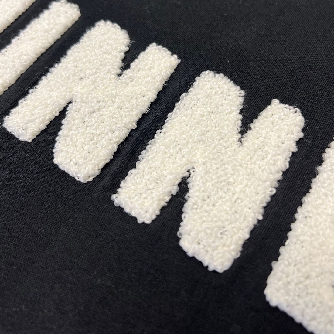 Guinness T-Shirt mit reliefartigem Schriftzug aus Chenille L